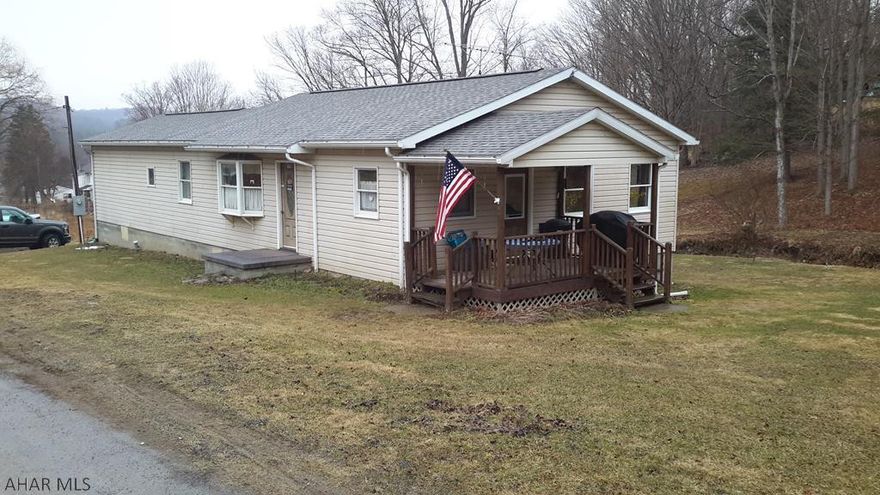 Nice home in the country! Started out as a mobile home, but now a cozy 3 bedroom 1 bathroom updated home on it's own foundation. The home sits on almost an acre with a stream and a bridge. Newer roof, electric box and central air. Enjoy the fresh air on 1 of 2 decks or entertain your guests in the well equipped kitchen and dining room. Everything you need is on one level! Title has been surrendered to this home.