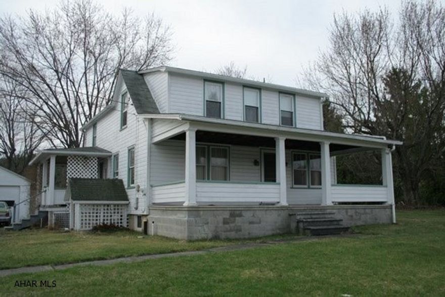 1 -1/2 story home located on a level lot in the quiet town of Alum Bank. Original hardwood floors throughout the entire home and a newly remodeled bathroom upstairs. Large windows provide lots of natural lighting. Partially finished, walkout basement with a bathroom and shower. A large truck garage and a two-car garage also on the property. Property sold AS-IS.