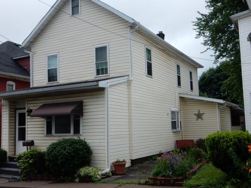 Don't be deceived by the size of this home from the outside. Lots of space, storage and has been totally updated. Solid oak flooring, stair case, cabinets and much more.  Partially enclosed deck, mud room, 2 car garage and additional lot (0.22) included for parking.  Third floor could be finished and is very large, but not heated.  Newer roof, 2 years.  Additional lot is located across from VFW, from corner of street frontage, to fire hydrant.