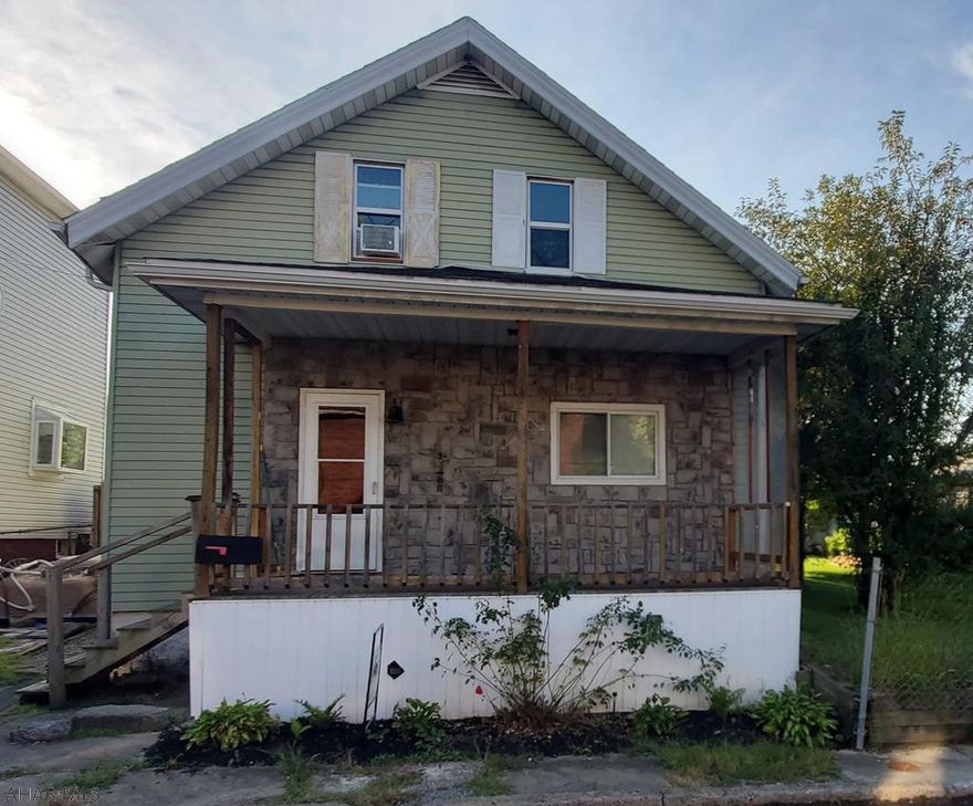 This Sankertown home features  4 bedrooms, 1.5 bath, a modern  eat in kitchen, first floor bedroom and first floor laundry, detached garage and off street parking all on a double lot!