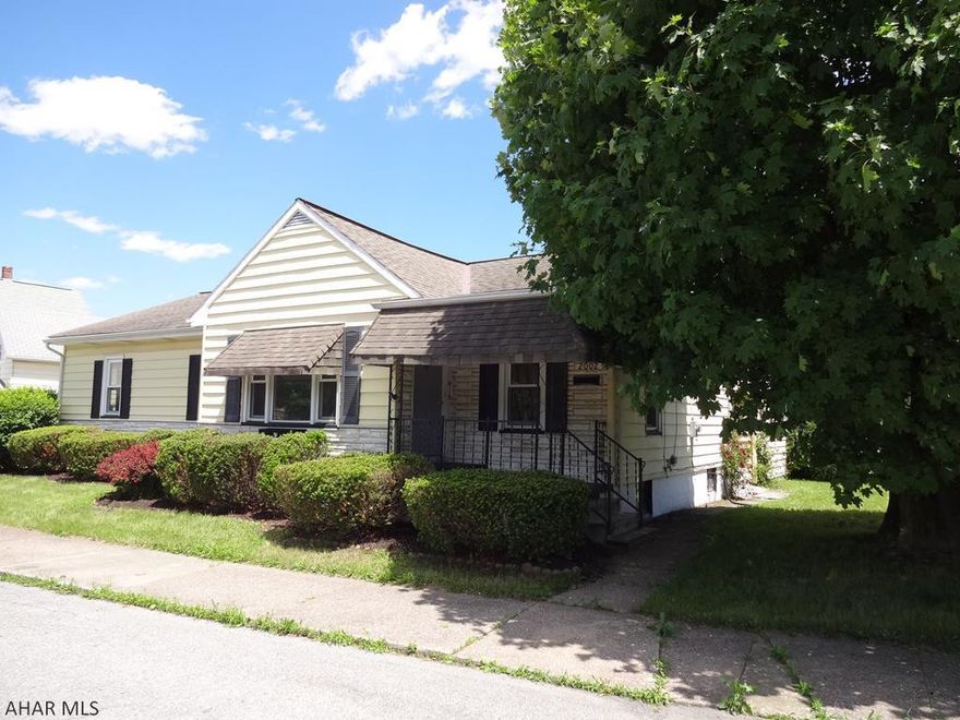 MOVE-IN READY in the Tyrone borough!  Experience easy one-floor living in this updated ranch home boasting a completely remodeled kitchen with new stainless steel appliances, fresh & clean subway tile back splash, and hickory cabinets --- a lovely space for entertaining!  Appreciate beautiful (original) hardwood floors, newer windows, and a first floor laundry with new washer & dryer.  Outside, enjoy relaxing on the shady front porch or on the private back patio.  Other appealing features of this home include a walkout basement, plenty of storage throughout, central air, and a two-car garage.  One of the sellers is a PA real estate licensee.