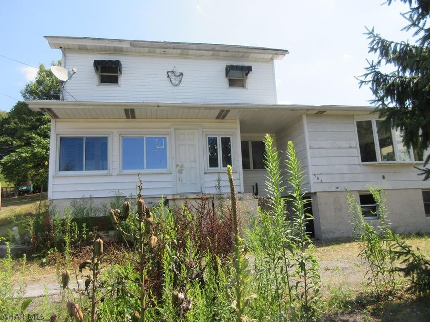 Coalport area 2 story home with loads of living space and detached garage with workshop area, but needs TLC throughout. Nice area and loads of potential. AS-IS sale. Seller will make no repairs.