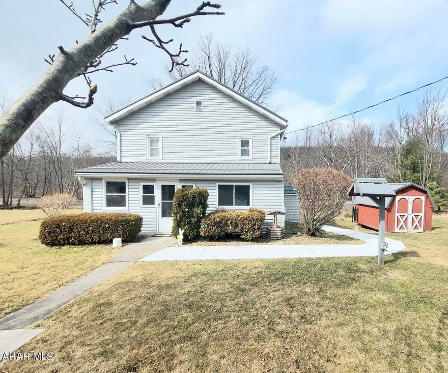 Check out this beautiful 3 bedroom, 1 1/2 bath two story on almost an acre. This accentuates country living at its finest. Home features newer roof. Shed and garage for storage as well as a workshop. Priced to sell