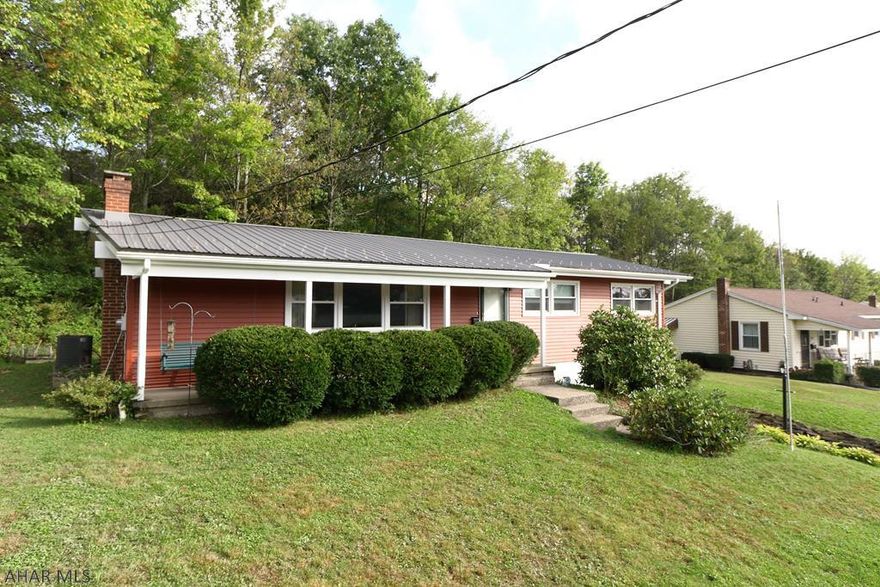 Check out this one-of-a-kind home in the Fairview area of Altoona, PA. This mid-century modern home has 3 bedroom, including a master bedroom that connects to a half- bath. Also includes a marvelous vaulted-ceiling living area, connected to dining room. Birch cabinets in kitchen with enough space to accommodate a small table for less formal dining. Vast amount of space in basement, including garage and area for workshop. Don't miss this opportunity, ask to see this house today!
