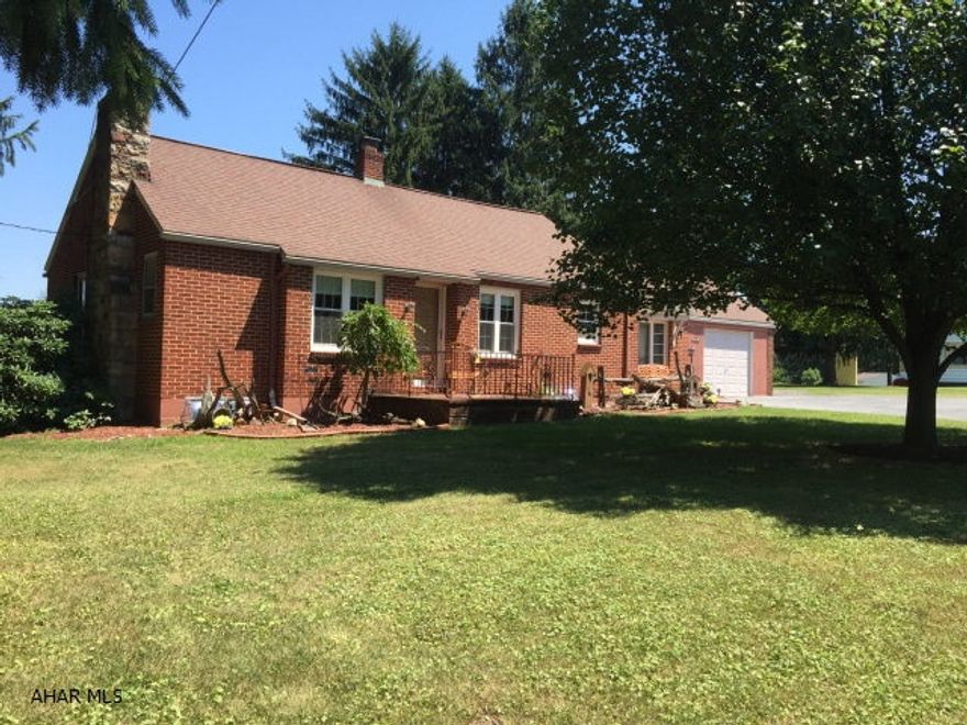 Spacious, updated, and ready to move into! This brick rancher has 2 nice bedrooms with finished/heated 3rd floor that could be used as a bedroom also. Formal living room has wood fireplace (with electric insert) and new carpet. 2 Updated baths. Large family room on the first floor. Bright cheery kitchen with tons of counter space and cabinets. One car attached garage and a .41 acre lot that is flat and not in a flood zone. Tons of curb appeal! Don't miss this one.