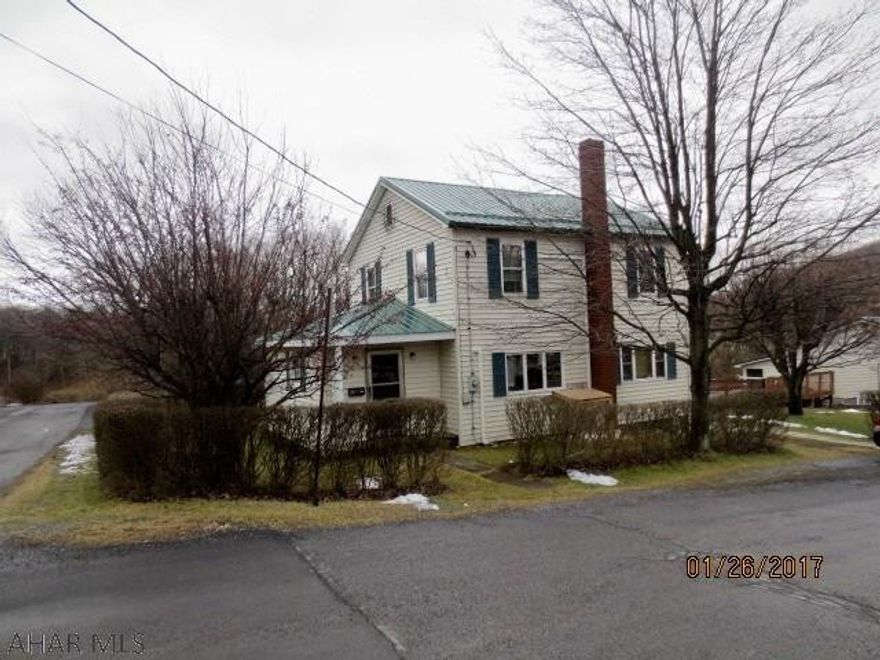 also includes a 36'x38' heated garage with work area & 1/2 bath and above ground pool. House has Oil H.W heat and heat pump with heat and airconditioning