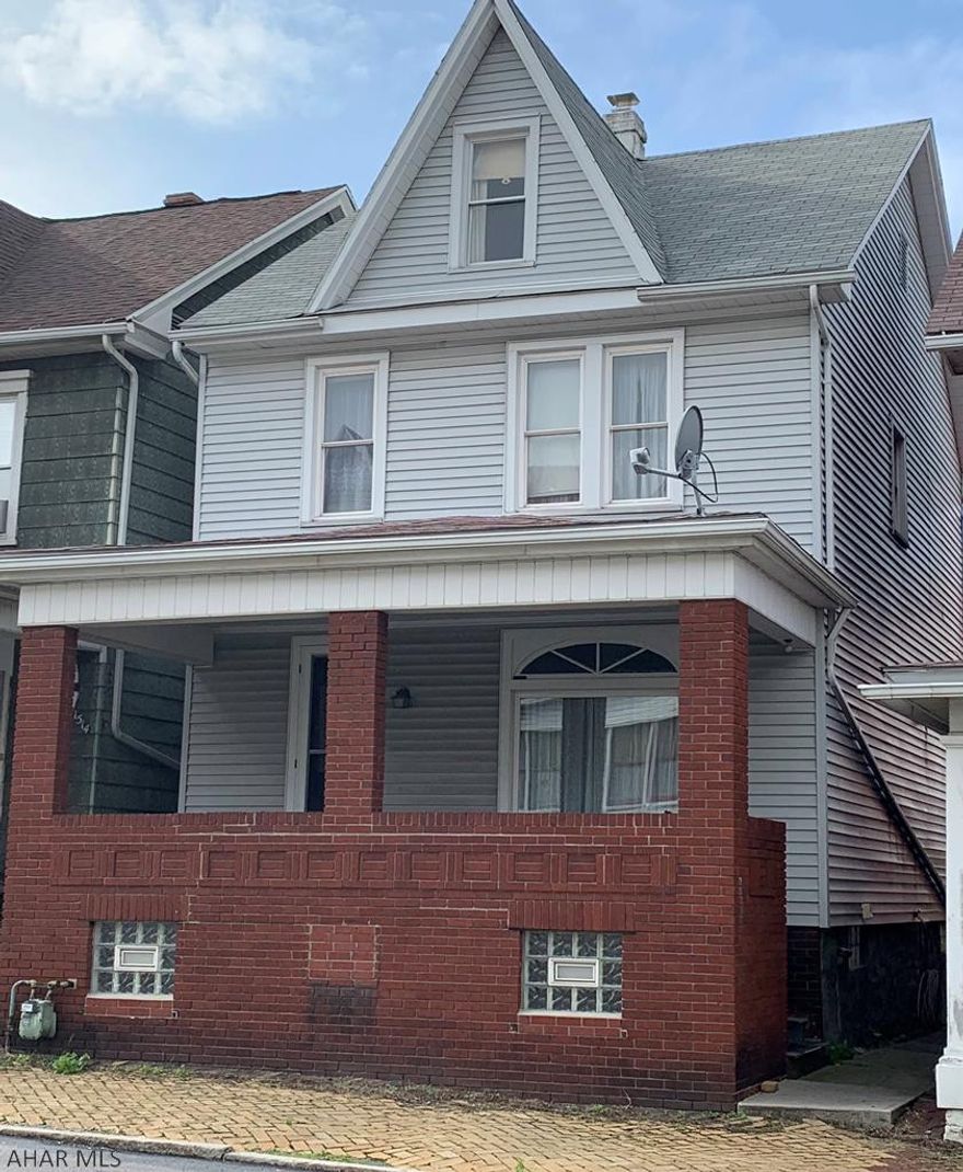 Perfect starter home or investment property.  The home features large rooms, hardwood throughout and a 1 car garage with storage/workshop above.  Newer mechanics with W/D, stove and window treatments included! Call for your showing today!