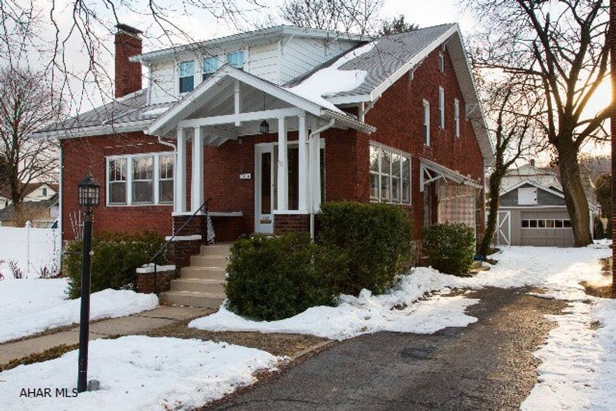 This is a beautiful, large, 5 bedroom brick home.  Very charming, with original wood work, built-in's, custom cabinetry in the kitchen with granite island & corian countertops.  Living space abounds with a large family room on the first floor and a potential family room on the second floor.  And storage won't be a issue w/ several walk in closets and storages spaces built in.  This house is bigger than it looks and is a must see!  The outside is equally as charming with a in ground swimming pool and raised beds for gardening.  For additional pictures, please be sure to check out the virtual tour link.