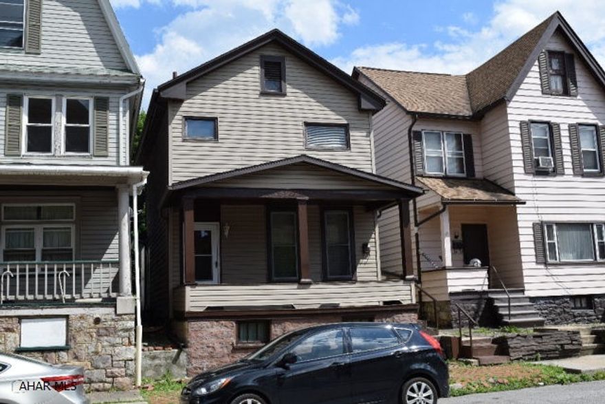 Move in ready home with newly renovated bathroom, newer roof including sheathing. Walk up attic storage. Covered front and back porches and a patio in the back. Partially fenced in back yard and off street parking from the alley.