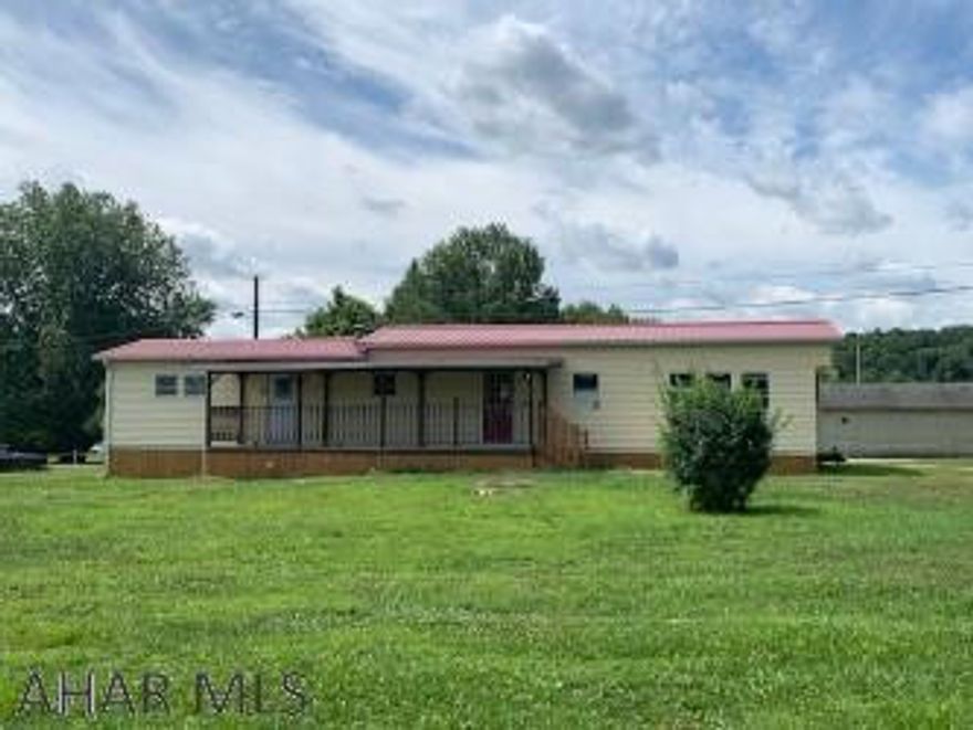 Why rent when you can own this very well maintained 3 bedroom mobile home? Features include new windows and roof, covered deck, new wood skirting, and all appliances included. Situated on almost 1/2 acre lot with public water and sewer this home is waiting for you.