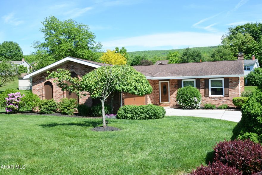 Nothing to do but move in to this Ranch home!  Larger than it Looks.  The home has been meticulously maintained and improved over the years. Upgrades include an Owners' Suite expansion with HUGE walk-in closet, a new 40 year roof, new boiler and A/C system, Concrete driveway, upgraded kitchen and baths....too many things to mention, but there is a detailed list available.  The 1st floor consists of the LR, DR, Eat-in Kitchen, 3 bedrooms and 2 baths.  Downstairs you'll find a daylight, walk-out basement, Family Room with FP, Bedroom or Office/Bonus Room a Half Bath, Laundry, Sunroom and Tons of Storage. Check out the photos for additional descriptions.  There is a bright, clean Garage for 2 Cars PLUS a Rear Shed for the Mower.  Public Sewer and a .46 acre Lot. Great location with a Country Feel, but Easy Access to Major Highways....Easy Commute to State College, too!