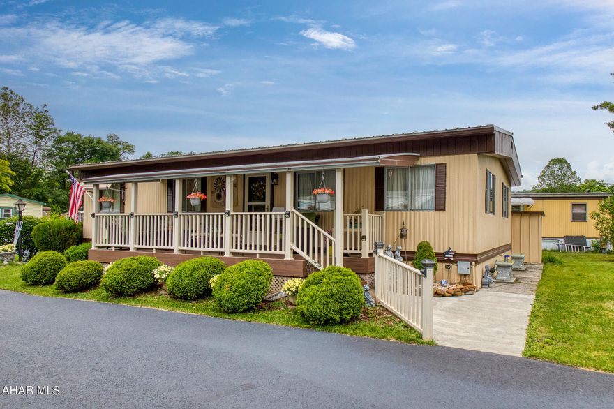 Home is located is a 55+ mobile park. Mobile home was built in 1978, completely renovated in 2012. Updated kitchen with water proof plank flooring, stackable washer and dryer built in kitchen, Spacious bedroom with walk in closet, spacious living room with composite porch off living room. Dining area, carport. New roof in 2021 with lifetime paint warranty, snow guard. Corner lot.