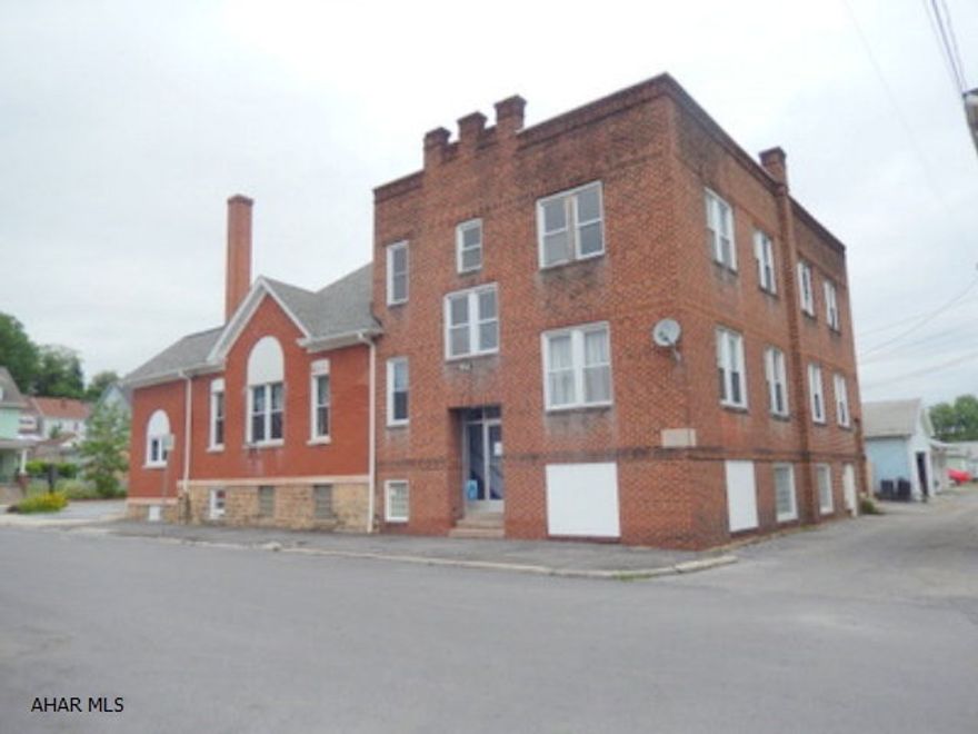 Located on 6th Avenue this building is highly visible. Multi Purpose ... church, day care, offices, instruction, apartments.  Parking lot (8) and also many available side street parking spaces. The first floor and basement is currently rented to a Martial Arts Studio/Artist Studio. 1st floor has a large gathering room (48X31), offices and a bathroom. Basement has 2 large gathering rooms and bathrooms. 2nd floor has an apartment (vacant) and storage rooms. Showings need to be completed by 3:30 PM during the week. No showing Saturday between 12:00 and 2:00 PM. Sunday is available all day.