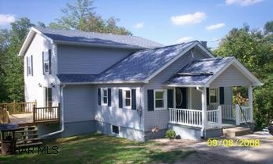 2 Story, 3 BR, 2 Bath, kitchen-dining combo, LR, Laundry Room, Full unfinished basement. House totally redone.  New roof, windows, siding, drywall, kitchen, 2 baths, new plumbing, electrical, hot water tank, new well & pump.