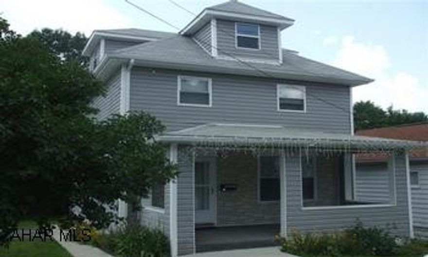 Completely updated 3 bedroom home features a first floor laundry room, laminate flooring, an oak kitchen, oak trim and a covered deck.  Updated inside and out.  A must see!!