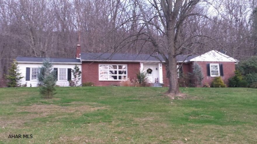 This updated ranch sits on 2+ acre in the highly desired Meadowbrook Terrace. A wooded backyard and lovely view of mountain and the town of Bedford. 3 bedrooms, 2 baths, an open living room and dining room combination w/ large windows and view. Beautiful hardwood floors throughout and large spacious windows. The living room features a stone fireplace w/ built in book shelves and cabinets. There is a one car garage and a black top driveway. The outside offers a large concrete patio; mature landscaping, a wood picket fenced in yard and a storage shed. Both bathrooms are tastefully updated w/ new ceramic floor and wall tile. The one bath has a Jacuzzi bath tub. Full attic storage and a full basement that has been partially finished. Ideal location and within walking distance to town.