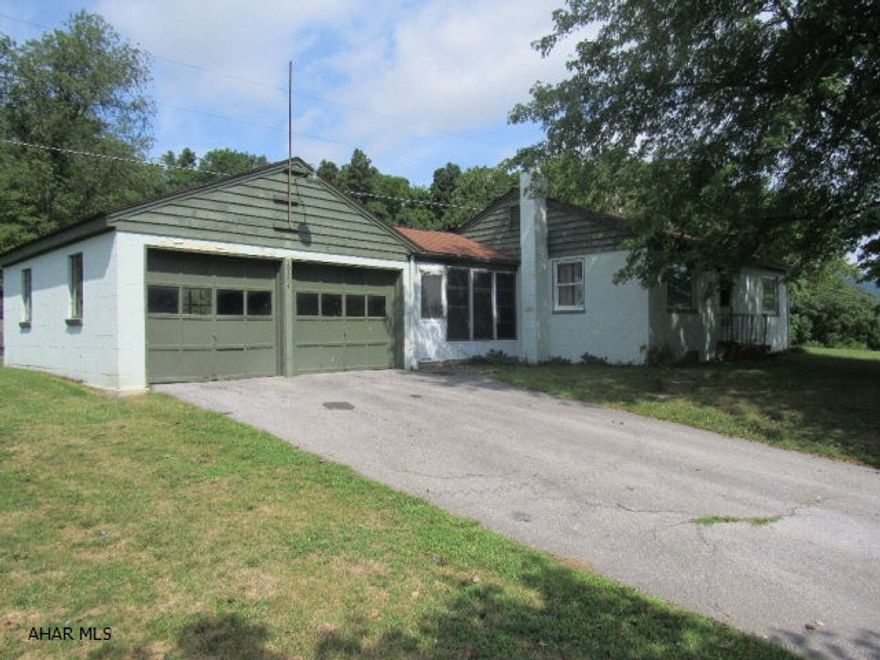 Great starter home,vacation getaway, or Lake Raystown Rental and only 1.2 miles to Shy Beaver boat launch. This home is situated on a .5 acre and has 3BR, 2BA, 1st Flr Laundry, a 2 car detached garage off a 12x22 Breezeway and an integral garage on opposite end of home for your lawn mower,jet skis etc. The home needs some TLC but could be a great home once updated. The seller is motivated and priced it to sell, and will not make any repairs.