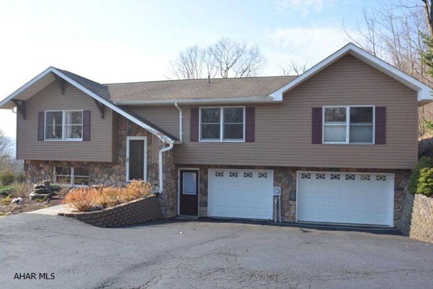 One of a kind home with 4BR & 3 baths. This custom built home has it all with the granite counter tops & all stainless appliances. The large master bedroom suite features large walk in closet, double sink, gas fireplace and leads out to a private deck. Finished lower level and newly updated 3/4 bath. Sip your coffee while enjoying the screened patio that over looks the heated pool area and enjoy the spectacular view. Freshly painted interior so all that is needed is your furniture.