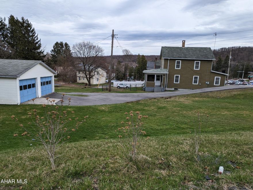 Open House, Sunday, August 6, 1-3 p.m. 

Looking for garage space in Ebensburg Borough?  This 3-bedroom home has two detached garages.  Each garage will hold 2 cars, so that's four (4) garage spaces...plus a 2nd-floor workshop above one of the garages.  This property is directly across the street from the entrance to the Ghost Town Trail.  I bet Ebensburg residents would like it if someone opened up a bike rental business right there!  That would be convenient.  There are also plans in the works for a dog park to be created directly across the street, behind the Animal Hospital (see last 2 pictures).  This property is zoned 'Mixed Use Village Commerical,' so you can open up a business, if you so desire.  Contact listing agent for a list of acceptable uses. There is plenty of off-street parking along the shared driveway.  Call soon to schedule a tour.