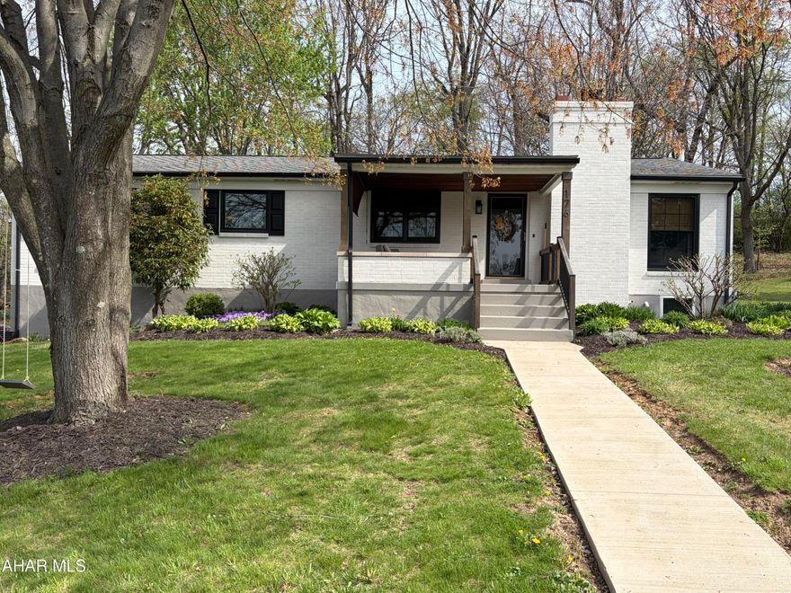 Pack your boxes and bags because this home is ready for you. This 3 bedroom, 2 bath home has been meticulously upgraded with attention to detail throughout.  Nothing for a new buyer to do but move on in.  The new  eat-in kitchen is simply gorgeous with tons of natural light and counter space for the cook in the family.  The hardwood floors throughout are simply stunning.  With the space of a multi-level you won't believe it is a ranch home.  Nestled on a quiet street Hollidaysburg you will feel like you are in the country with the undisturbed woods in your backyard.  There is so much to say about this home  but schedule your showing today and see in person all this home offers.