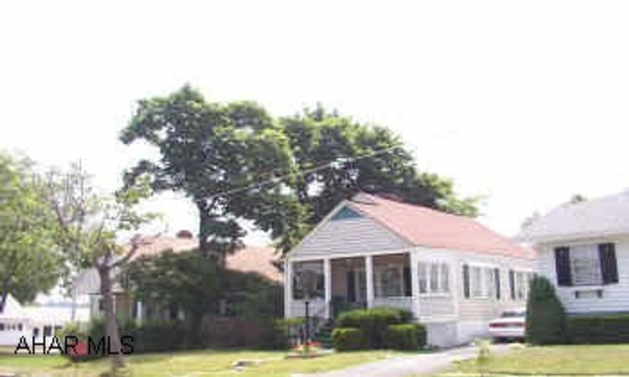 Charming 3 bedroom Cape Cod in move-in conditon.  Second floor has bonus room with built-ins.  Roof approximately six years old.  Fenced in yard with 7' privacy fence.  Quiet street.  Won't last!  Shared driveway. Charming 3 bedroom Cape Cod in move-in conditon.  Second floor has bonus room with built-ins.  Roof approximately six years old.  Fenced in yard with 7' privacy fence.  Quiet street.  Won't last!  Shared driveway.