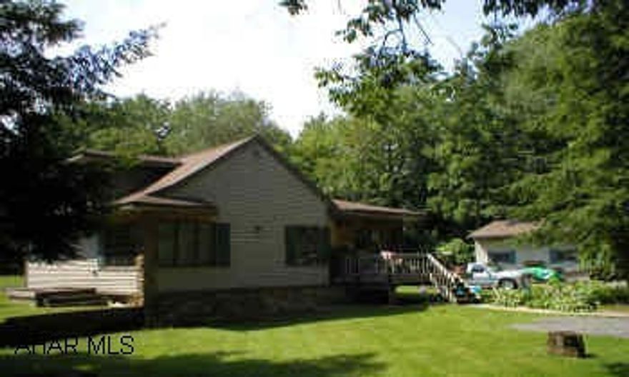 Nice 1 1/2 story with vinyl siding and stone on 1/2 acre.  75% remodeled, 1st BR on 1st floor, 2nd BR on loft, fireplace, 200 amp, 1 car garage.  Basement entry is under carpet in entrance.  Call Allen or Tamara. Nice 1 1/2 story with vinyl siding and stone on 1/2 acre.  75% remodeled, 1st BR on 1st floor, 2nd BR on loft, fireplace, 200 amp, 1 car garage.  Basement entry is under carpet in entrance.  Call Allen or Tamara.