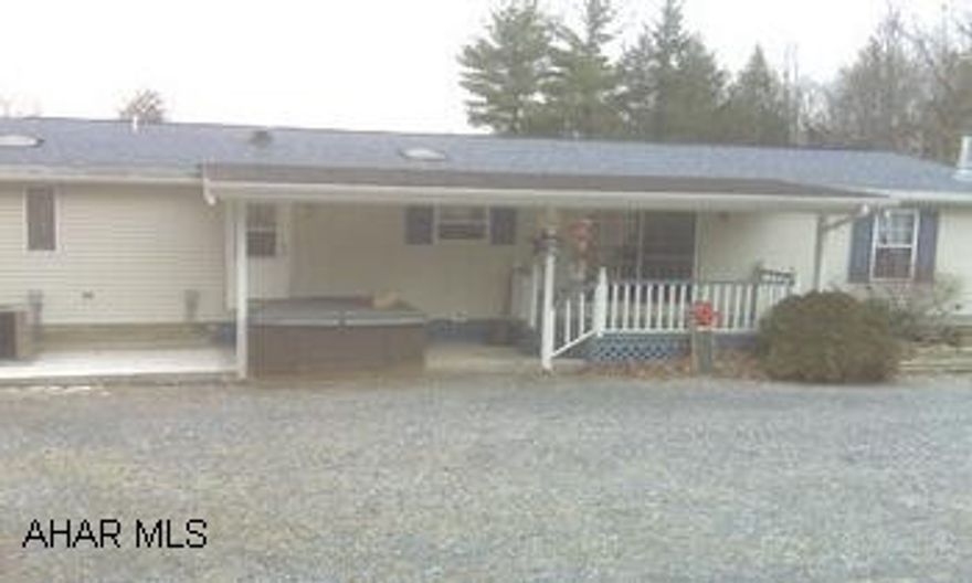 Very nice one story modular home with wood burning fireplace in family room.  Beautiful views from covered rear porch.  Two car garage has heated workshop, second floor loft,  and high door for RV or boat storage.  Tractor stays with property. Very nice one story modular home with wood burning fireplace in family room.  Beautiful views from covered rear porch.  Two car garage has heated workshop, second floor loft, and high door at rear for RV or boat storage.  Tractor is included in sale.  Directions:  From Rt. 866, turn onto Clover Creek Road and go 5 miles to Eastep Road on the right.  Property is third house on the left.