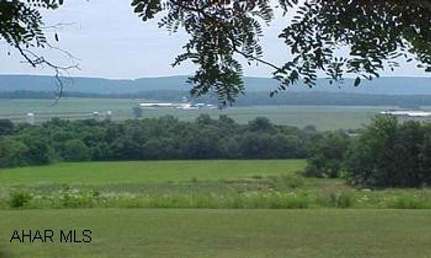 Great View!  Owner:  Estate of Fred & Dolores Vaughn by Executrixs Regina Brumbaugh & Judith Estep.  Approx 1 acre of woods.  Balance is open with view.  Survey on file.  Lot 1 Tract 1 Map 12-14-22D.  #J-827  Huston Township. Approx 1 acre of woods.  Balance is open with view.  Survey on file.  Lot 1 Tract 1 Map 12-14-22D.  #J-827 Huston Township.