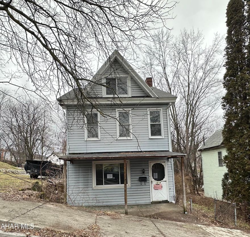 Spacious two story in the City of Altoona, vinyl siding, 3 bedrooms, 1.5 baths, off street parking, carport,