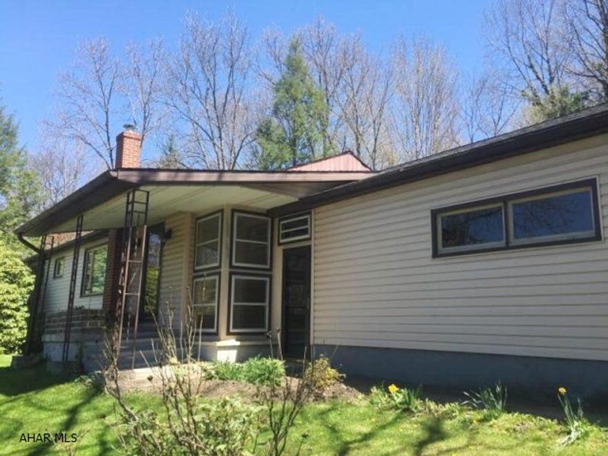 Logan township. 3 bedroom, 2 bath ranch on a private wooded lot. Well built house featuring large rooms, hardwood floors and private sunroom! Be only the 2nd owners of this great property!