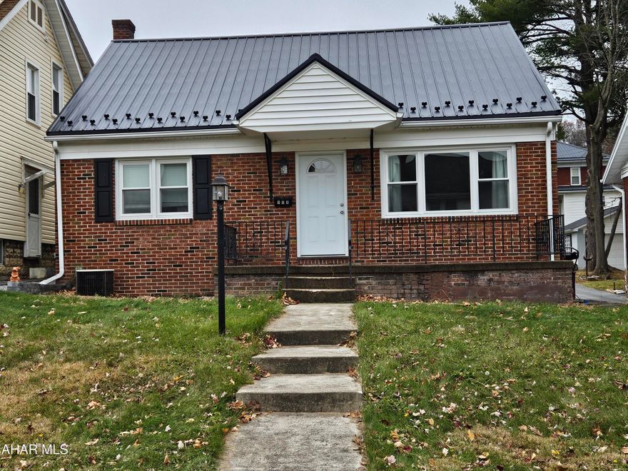 Cozy and fully refurbished 3-bedroom, 1-bath home featuring fresh updates throughout, gleaming hardwood floors, and convenient off-street parking. Move-in ready with modern touches and inviting charm.