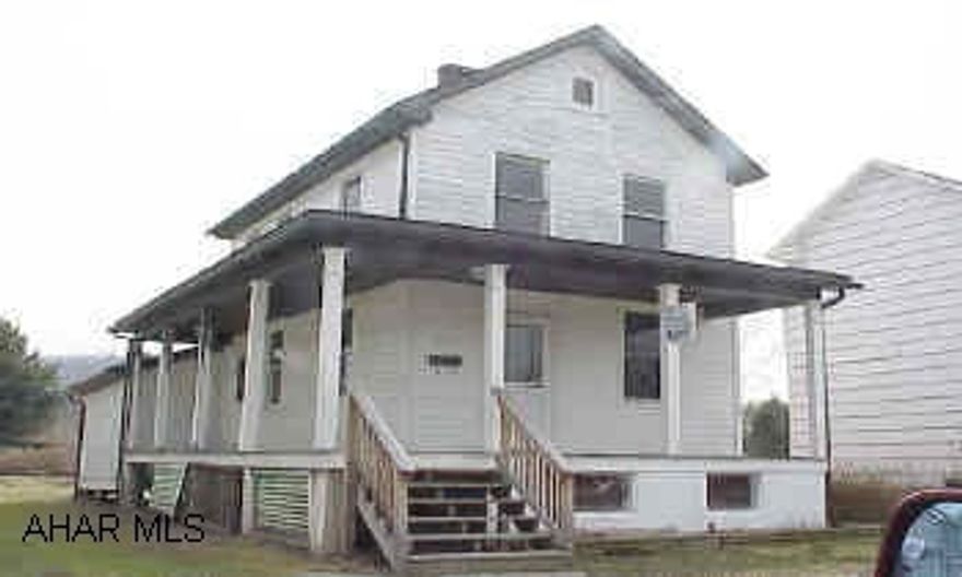Needs lot of work - Newer roof, soffit, and hot water furnace.  Flood Plain.  30 amp fuse knob & tube.