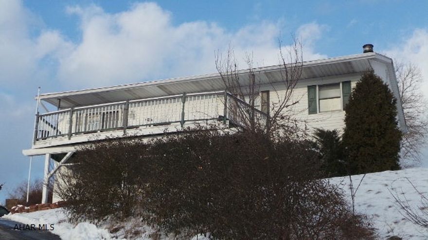 Lot size 120 x 120 x 164 x 213. New kitchen and appliances plus laminate flooring, new in 2014. 2 Bedroom on main level could be 3 again with a wall. Lower level family room with fireplace. Check out the view!