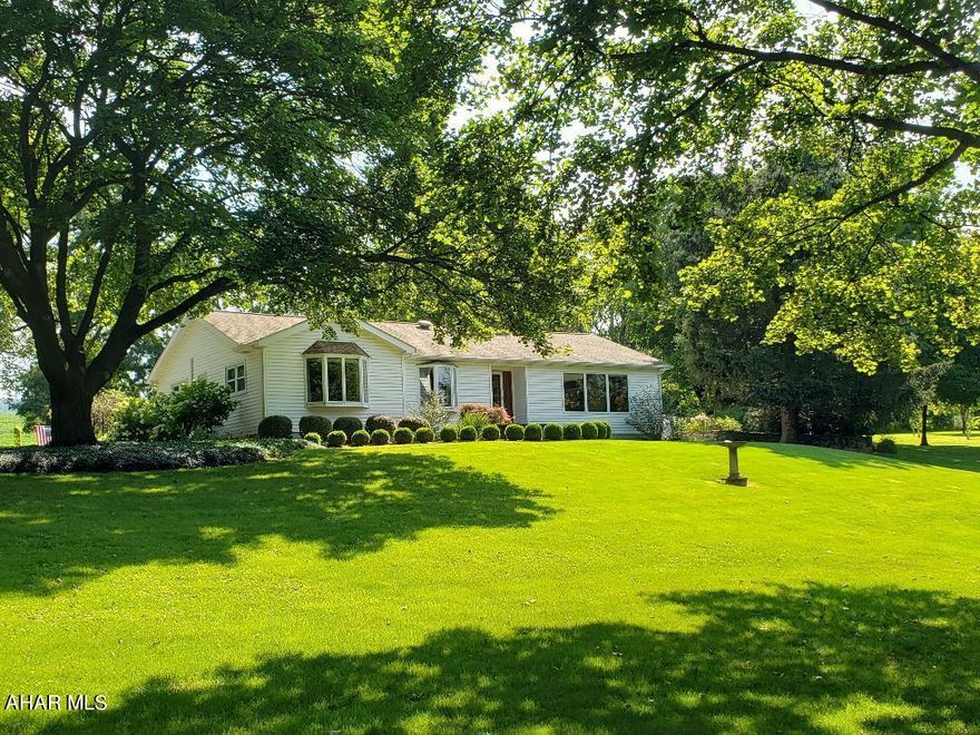 Immaculate 4-bedroom 2.5-bath home on 2.45 acres tucked in the corner of the borough (includes .849 acres zoned commercial w/Route 36 frontage). 1 bedroom has been converted to an exquisite walk-in closet but could be converted back to 4th bedroom. There's a 1st-floor laundry/lounge off Kitchen, beautiful finished basement w/family room, bar infrared sauna & workout equipment. Beautiful setting with dozens of mature trees & lots of newly planted trees, attached garage, separate garden shed, 2 patios, 2 raised garden beds & picturesque views. J-635