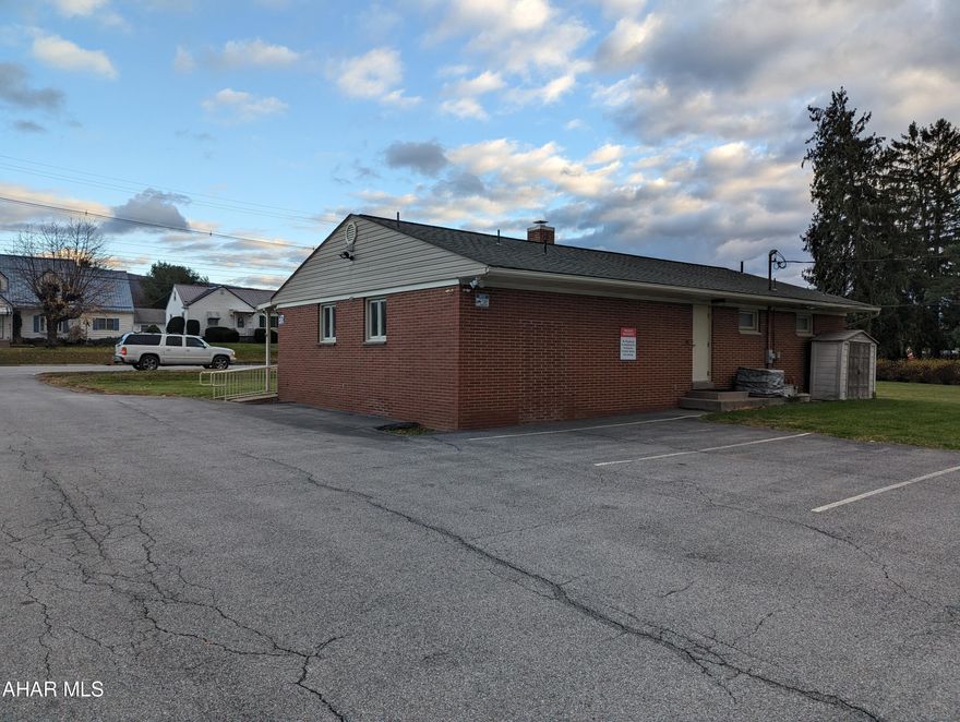 High traffic location for your business. Currently used as a MD office but could be suited to many professional purposes. Handicap accessible entrance and bathrooms. Currently configured with 3 patient exam rooms, office admin and nurses station with large waiting room. Basement is fully finished with a full kitchen and full bath along with executive office and additional office and storage space.  Super well built and well maintained with lots of parking. Additional lot next door is included and deeded separately.