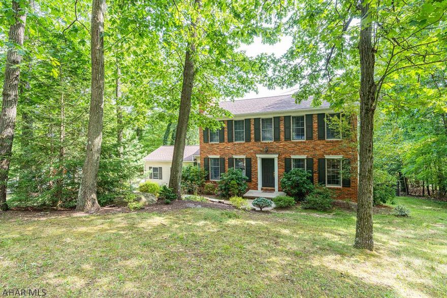 Stonehedge Stately 2 story.  3-4 BRs, flexible floor plan which lends itself perfectly for a home office or remote schooling. All baths have been recently updated and the upstairs boasts a Jack-n-Jill type set up. Double doors lead to the Owners' Suite, complete with HW Flooring, walk-in closet and a beautiful new bath...Herringbone tile and glass shower. Main level has a spacious Great Room with a stone FP and lots of windows, a Sun Room is the perfect spot for enjoying morning coffee.  Lower level has it's own entrance and could be an in-law suite or another option for a home office.  Entertaining is easy with the composite deck just steps away...all within a fenced rear yard. Freshly painted interior, floors have been redone and the boiler + hot water heater were replaced this year.