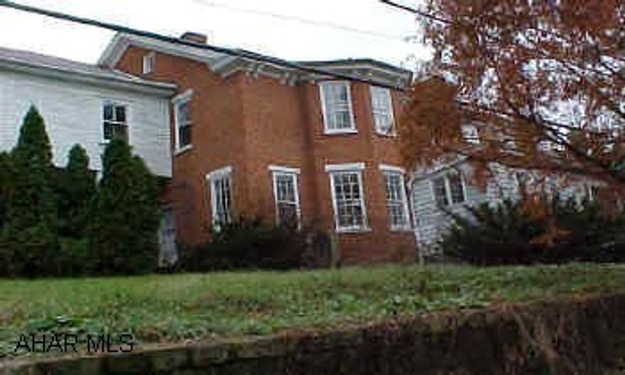 Terrific 2.5 Story Brick- (Brick Barn is located in Blair Township on 12.9 Acres) Both Need TLC 2 Sewer Lines on Property- Survey on Record, 55.6 Acres to be Sold in conjuction with Bordering Bedford Street property & Chimney Rock Blvd Parcel. All 5 Parcels being sold as one  property for $1,400,000.