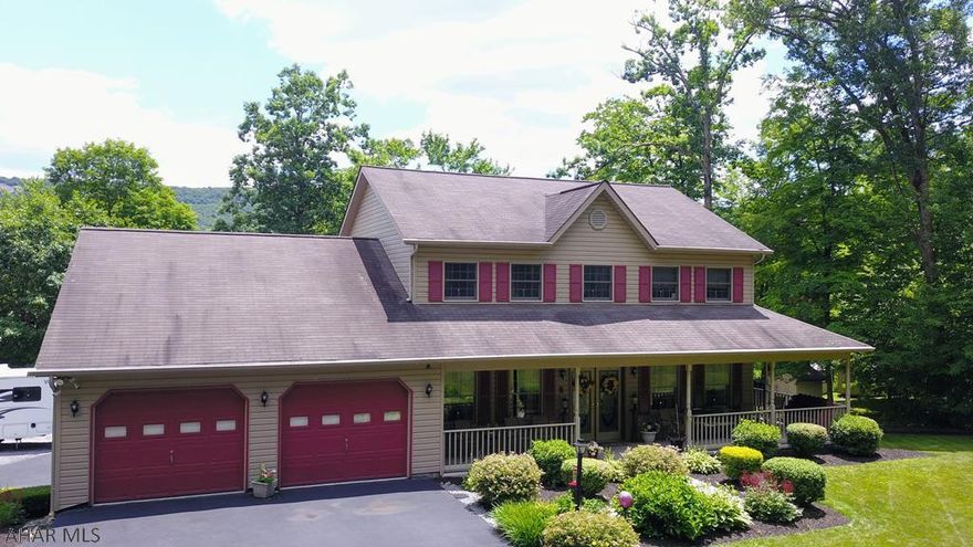 Are you looking for peace and quiet in a rural setting that's not too far from town? This beautifully maintained home sits on 7.04 acres of paradise. This quality built home with oak trim features 5 bedrooms, 2 full baths, 2 half baths and 4.5 garage bays. The open concept kitchen/dining area/family room is a great place to entertain. The kitchen has oak cabinets, ceramic tile counters and a ceramic tile back splash.  Have large gatherings in the spacious family room. The formal dining room is a great place for a meal with friends or family.  Store your toys or create a workshop in the 40 by 48 pole building.  Enjoy nature sitting on the porch or hiking the trails among a great mixture of young and mature trees. Security cameras offer a 360 degree view. Owner prefers an August 31 closing.