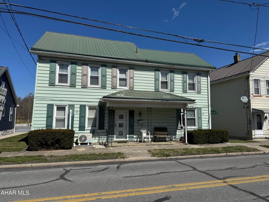 Vinyl sided two story home featuring 4 bedrooms, 2.5 baths, living room with laminate flooring, formal dining room, equipped kitchen with oak cabinets, and den. Detached two car garage and separate outbuilding. Mini splits provide additional heat and air conditioning. Attic storage. Very nice home that is move in ready. Being sold to settle an estate.