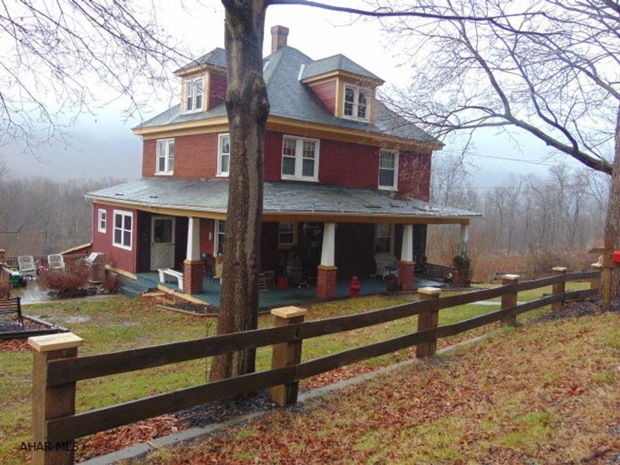 4 bedroom 1 bath home on 6.4 acres close to Bedford Springs.  Hardwood floors and original woodwork on main floor.  Being sold As-Is.