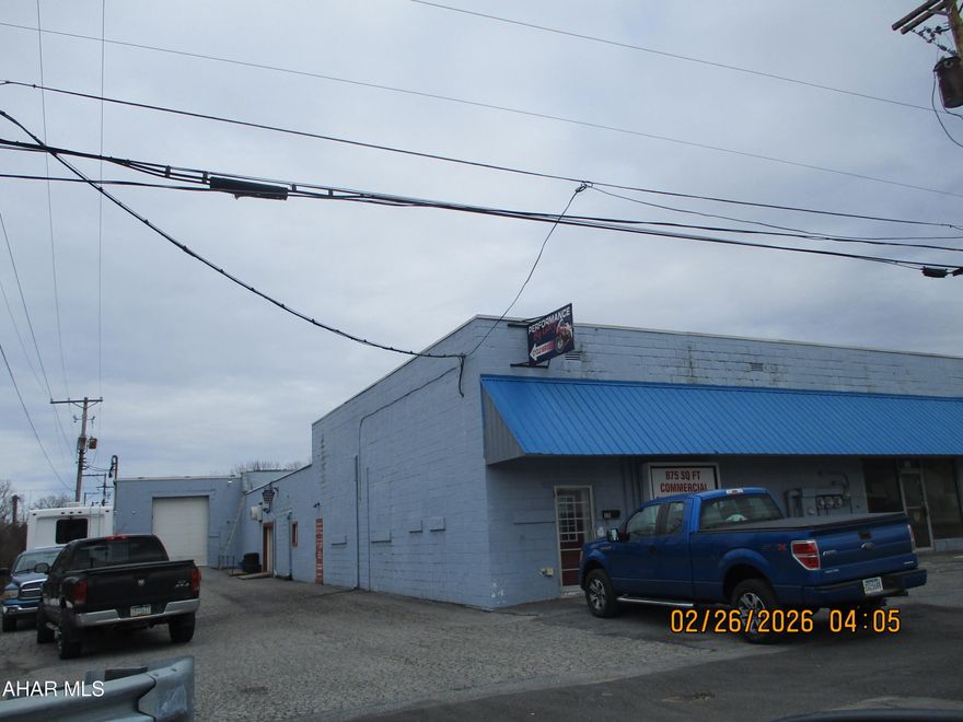 Spacious commercial site located near two major highways!  Over two level acres provides abundant parking for your business or investment interests.  The building is concrete block construction and includes a total of 23610 sq. feet of space.   Two current tenants will vacate prior to a closing.   Separate gas, electric and water meters allow for tenant paid utilities.