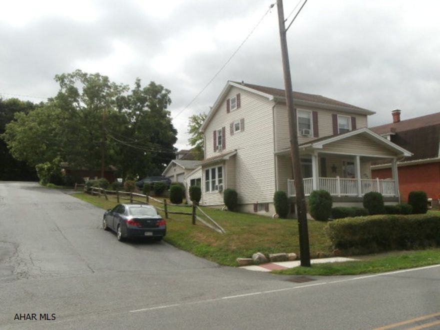 Charming family home! Great East End corner lot location. Vinyl sided two story home plenty of charm from the kitchen to the large formal dining room and large living room. Beautiful woodwork. Second floor three bedroom and bath. Front porch and first floor sunroom. Detached two car garage with paved drive. Very nice home for the $$.