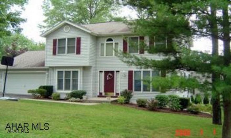 Holiday Manor - 2 story, spacious, 3 bedroom, 2.5 bath, formal dining room, eat-in kitchen, first floor family room, 1/2 bath, and laundry, finished basement includes recreational room, bonus room, and utility room with storage, central air, 2 car garage with floored storage above, deck, new roof, corner lot 108 x 114...Please Remove Shoes. Carpets cleaned. Taxes for 2017 have been reduced to $2,672.00