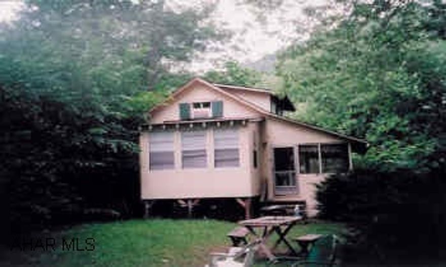 2 Cottages on .856 Acres, on River. Both Cottages have shared well, public sewage, shingle roof, propane heat.  Bedrooms etc shown in listing info are for cottage #1Cottage 2 has 2 bedroom a bath, great room.