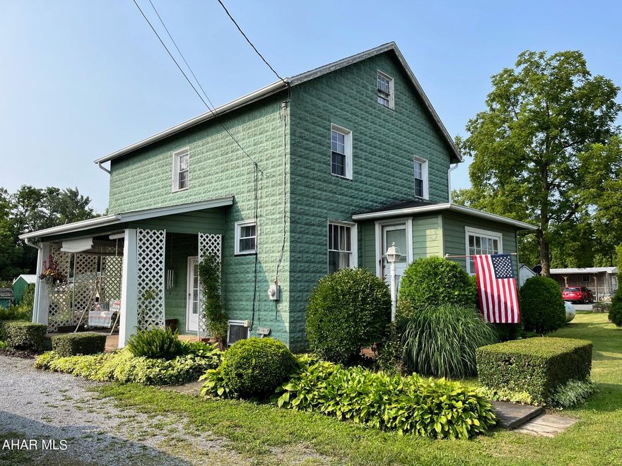 If you are looking for a solid home in a great location put this home on your list.  There is plenty of space inside with a large kitchen and a dining room with built in cabinets.  A spacious living room and a sun porch round out the first floor.  Upstairs you will find 3 bedrooms, 1 bath and walk up attic storage. For your convenience the upstairs windows have been replaced! The basement is well lit and is another great area for storage or play.  Even though this home is in a flood zone, the owner states water is not an issue and it is protected by a sump pump.  The large level backyard is a great space for entertaining and playing!  Schedule your showing today.