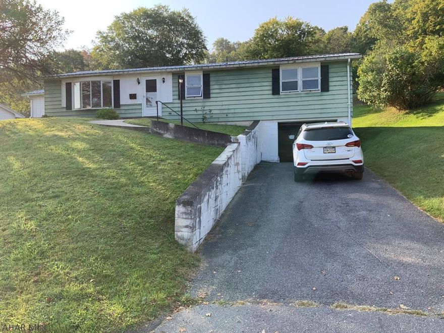 4 bedroom one story home with 2.5 bathroom within minutes of downtown Bedford.  This home is being sold as is.  Note, carpets have been removed in living room, bedroom and lower levels.  With a little work, this could be a great home in a fabulous location.