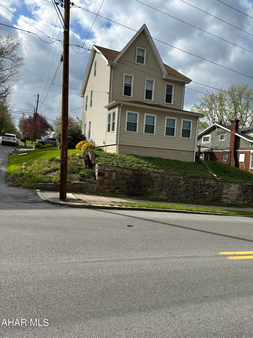 Modern kitchen & bath. Central Air. 2 car attached garage. Small fenced in side yard. 
Corner 50 x 120 lot.