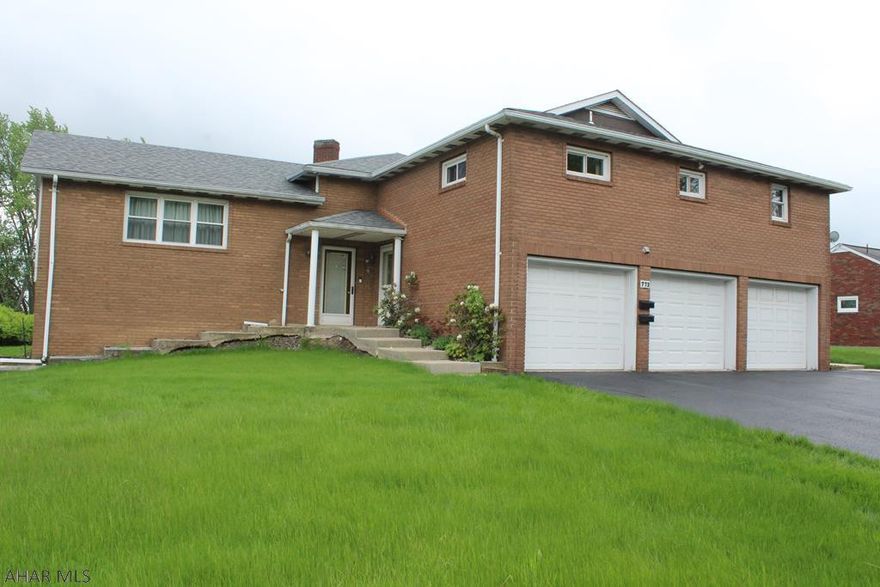 This meticulously built brick house is ready for you to call it home! This house has it all! A sturdy multi-level home with a living room and family room. A large eat-in kitchen with access to a covered porch makes for both indoor or outdoor eating options.  The second level boast a master bedroom with a 3/4 bath, a bedroom, office, and a full bath . You can walk out from lower family room onto a poured patio to enjoy the backyard which has a nice garden space ready to go. There is also a comfortable In-law suite attached to the house that could be used as an apartment. It has a comfortable living room, eat-in kitchen, full bath with laundry, spacious bedroom, and back porch. Three car garage, 2 driveways, and a workshop in the basement just add to the many conveniences this house offers.