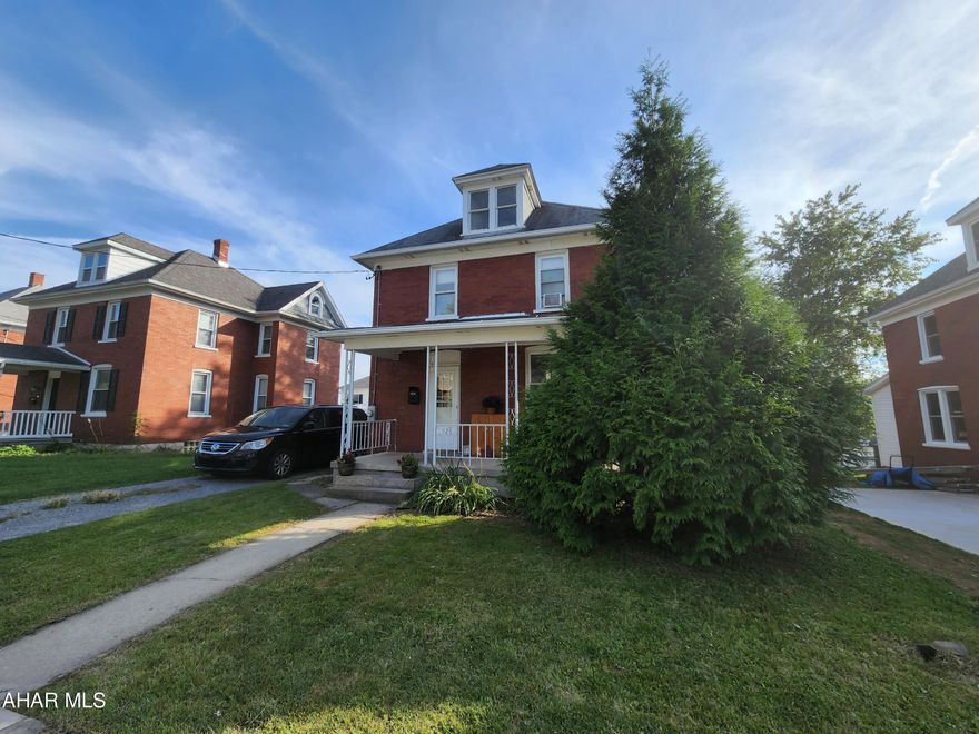 Charming three bedroom 1.5 bath home in Roaring Spring Borough, Spring Cove School District.  This home offers great original features with a nicely updated kitchen and first floor laundry. The first floor offers a living room, eat-in kitchen, bathroom, and laundry. The second floor offers three bedrooms a full bath and walk up attic. New paint throughout and carpeting, will give this home a great face-lift. There's a large deck outback for entertaining. Across the alley is a public playground and pavilion.  Call for more information.