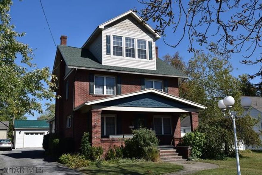 Hollidaysburg Borough beautifully remodeled 4 bedroom home with modern maple cabinets and open concept. The third floors light and airy master bedroom and bath could also make the perfect game room. Enjoy the private screened in back patio and fenced in yard. There is a large two car garage with room for a workshop or extra storage. Call the listing agent today for a private tour.